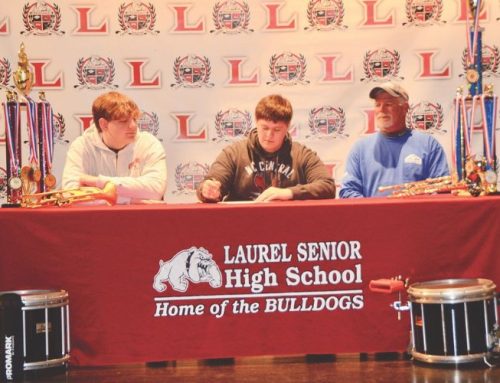 Laurel’s Dixon signs college letter of intent as band member, music major