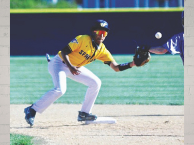 SEA – Sabino-Pineda Baseball infielder in a yellow Seattle uniform crouches near second base, glove ready as a ball approaches.